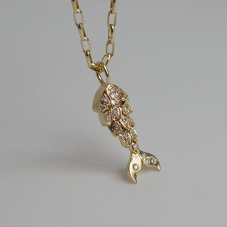 Layered charms and chains by Sorsa Jewellery