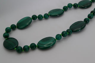 Ravello Malachite Necklace, graduated malachite beads on lime green thread with a 9k gold bolt ring clasp.