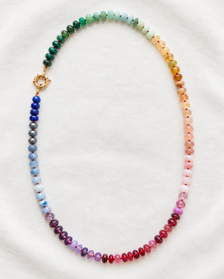Victoria Park Rainbow Gemstone Necklace, designed in collaboration with Laura Coleman, hand-knotted rainbow gemstones with a solid 9k gold clasp.