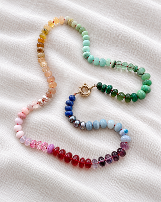 Victoria Park Rainbow Gemstone Necklace, designed in collaboration with Laura Coleman, hand-knotted rainbow gemstones with a solid 9k gold clasp.