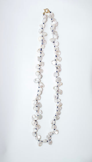 Pearl necklace on a white background