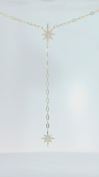 Celestial Moon Drop Necklace by Sorsa Jewellery, a diamond starburst falling to a crescent moon on a 9k gold oval rollo chain.