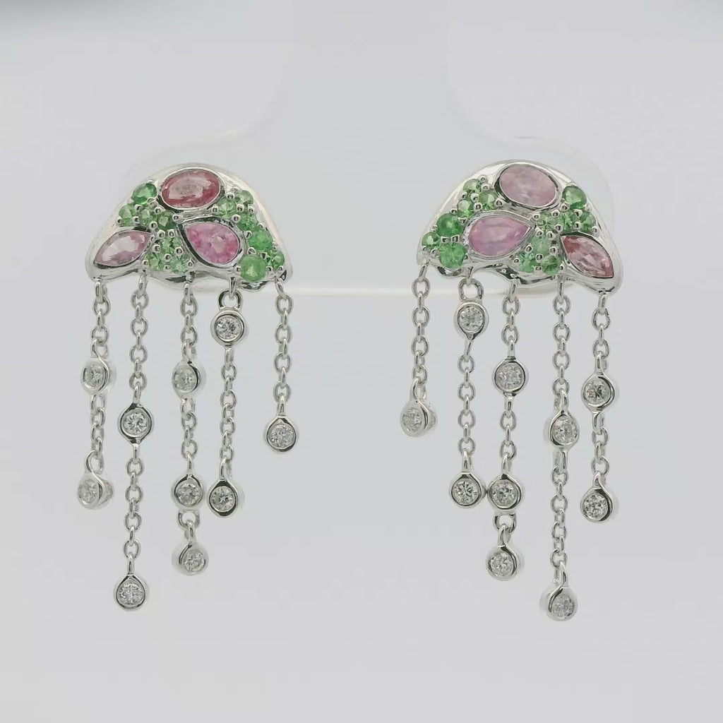 white gold jellyfish earring, with spinel, diamond and sapphires on a white background