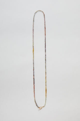 Appalachian Sapphire pullover necklace, hand-knotted sapphires on silk with a 14k gold toggle clasp.