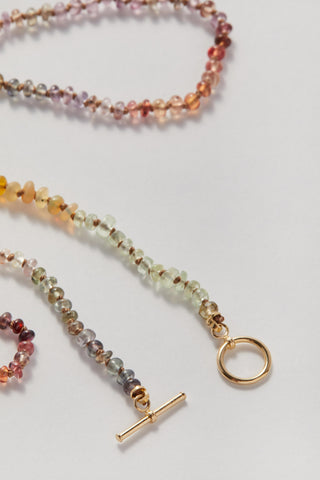 Appalachian Sapphire pullover necklace, hand-knotted sapphires on silk with a 14k gold toggle clasp.