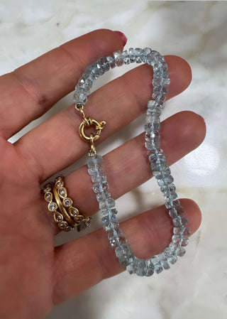 Aquamarine bracelet, gemstones knotted on silk thread with a solid 18k gold clasp.