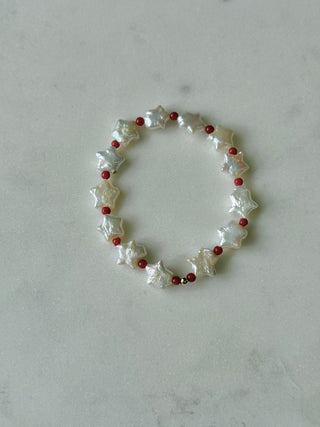 Beach Babe stretch bracelet, freshwater pearls with peridot or coral beads and a 14k gold bead.