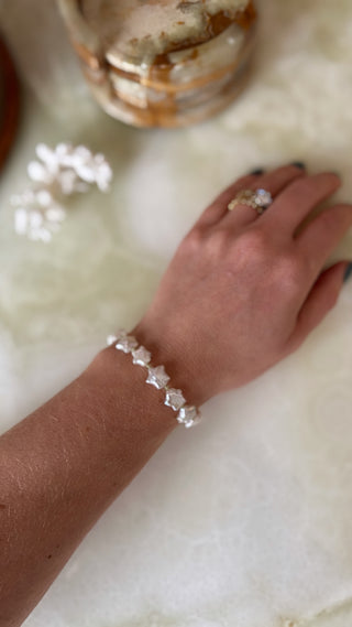 Beach Babe stretch bracelet, freshwater pearls with peridot or coral beads and a 14k gold bead.