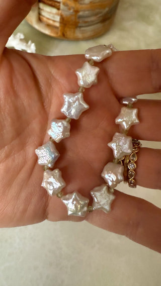 Beach Babe stretch bracelet, freshwater pearls with peridot or coral beads and a 14k gold bead.
