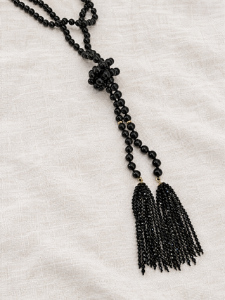 Black onyx beaded wrap necklace with faceted spinel fringe and 9k gold, by Sorsa Jewellery.