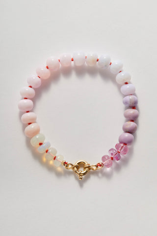 Blushing Rainbow bracelet in opal and pink topaz, hand-knotted silk with a 14k gold clasp.