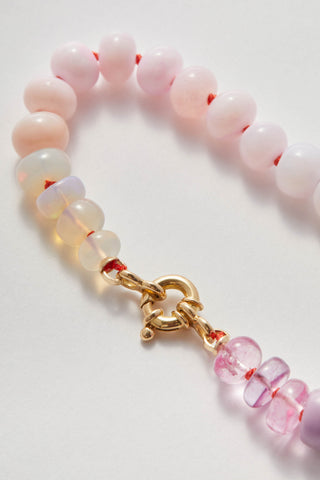 Blushing Rainbow bracelet in opal and pink topaz, hand-knotted silk with a 14k gold clasp.