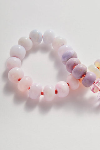 Blushing Rainbow bracelet in opal and pink topaz, hand-knotted silk with a 14k gold clasp.