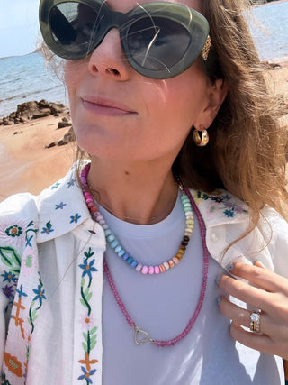 Candy Rainbow necklace, opal gemstones knotted on silk with a 9k gold bolt ring clasp.