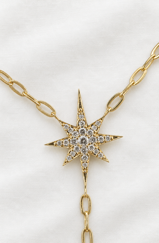 Diamond moon drop necklace in 9k gold, handmade in London by Sorsa Jewellery.