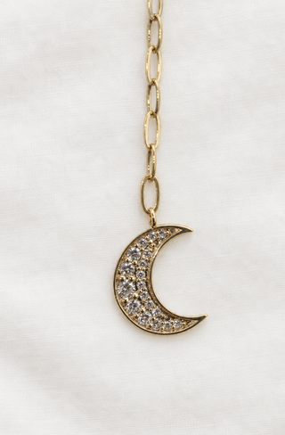 Diamond starburst and crescent moon necklace in 9k gold, by Sorsa Jewellery.