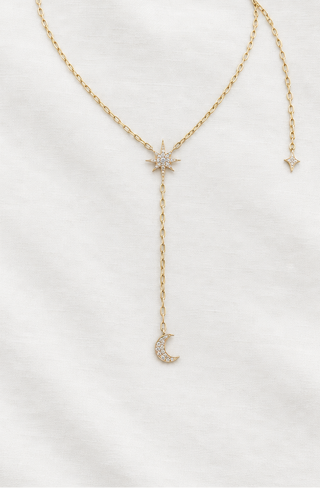 Star and moon diamond drop necklace in recycled 9k gold, by Sorsa Jewellery.