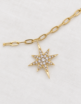 Diamond star charm necklace in 9k gold, the Celestial Star Dust Necklace by Sorsa Jewellery.