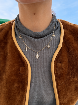 Diamond starburst necklace in recycled 9k gold, handmade in London by Sorsa Jewellery.