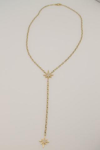 Celestial Starburst Drop Necklace by Sorsa Jewellery, pavé diamond starbursts on a 9k gold oval rollo chain.