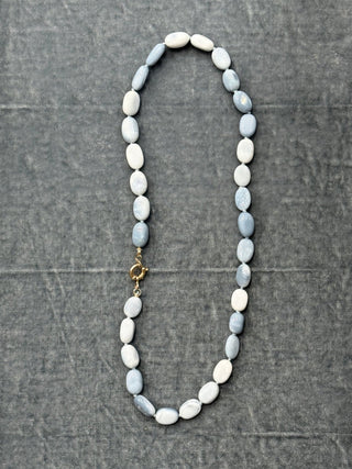 Cloudy Skies Opal Choker, blue opal beads on silk with a 14k gold diamond heart clasp.