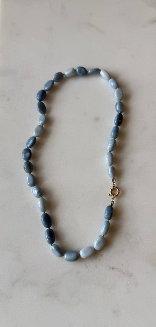 Cloudy Skies Opal Choker, blue opal beads on silk with a 14k gold diamond heart clasp.