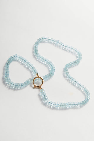 Faceted Aquamarine necklace, hand-knotted aquamarine beads on silk with a 14k gold bolt clasp.