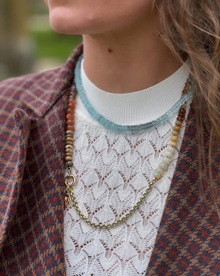 Faceted Aquamarine necklace, hand-knotted aquamarine beads on silk with a 14k gold bolt clasp.