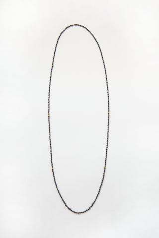 Faceted Black Spinel Pullover Necklace, hand-knotted on black silk with gold daisy beads, no clasp.
