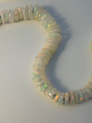 Graduated Opal Heishi Necklace by Sorsa Jewellery, opal discs graduating from 5mm to 10mm with a 9k gold clasp.