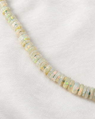 Heishi opal beaded necklace with 9k gold clasp, by Sorsa Jewellery.