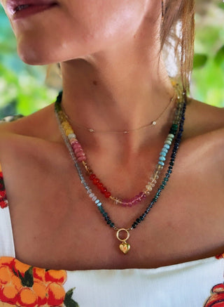 Large Tropical Rainbow necklace, mixed gemstones knotted on silk, styled with a vintage gold charm.