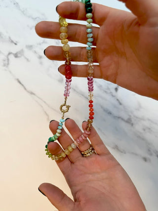 Large Tropical Rainbow necklace, mixed gemstones knotted on silk, styled with a vintage gold charm.