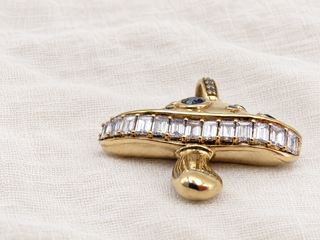 Magic Mushroom diamond charm in 9k gold, by Sorsa Jewellery.