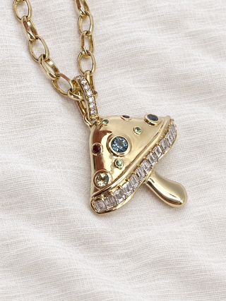Magic Mushroom diamond charm in 9k gold on a chain, by Sorsa Jewellery.