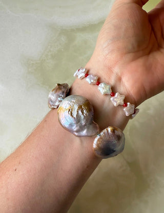 Mermaid Dreams bracelet, pink baroque pearls knotted on silk with a 14k gold bolt clasp.