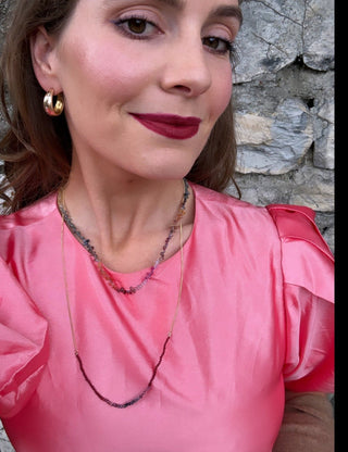 Mini Ruby and Rainbow Sapphire necklace on silk with a 9k gold curb chain, no clasp.