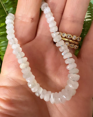 Moonstone New Beginnings bracelet, moonstone hand-knotted on silk with a 14k gold clasp.