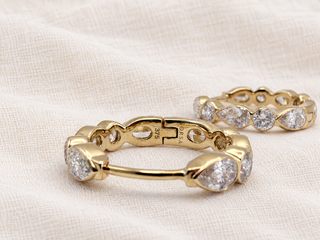 14mm pear and round diamond hoop earrings in 9k gold, by Sorsa Jewellery.
