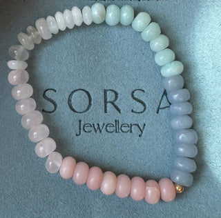 Pink Clouds Stretch Bracelet, hand-strung stretchy gemstones finished with a 14k gold bead.