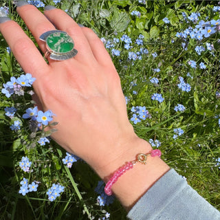 Pink topaz bracelet, gemstones knotted on silk thread with a solid 18k gold clasp.