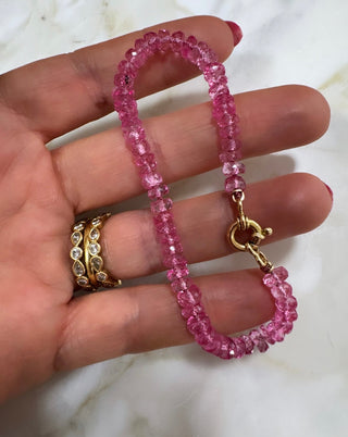 Pink topaz bracelet, gemstones knotted on silk thread with a solid 18k gold clasp.