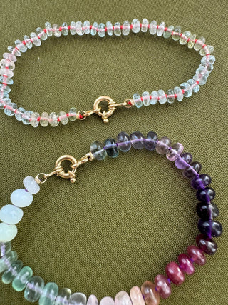 Plum Rainbow Bracelet, mixed gemstones knotted on silk with an 18k gold clasp.