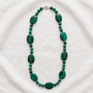 Ravello Malachite Necklace, graduated malachite beads on lime green thread with a 9k gold bolt ring clasp.