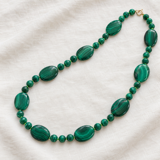Ravello Malachite Necklace, graduated malachite beads on lime green thread with a 9k gold bolt ring clasp.