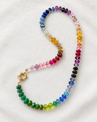 River Cafe Rainbow Gemstone Necklace with 9K Gold, hot pink and blue gemstones hand-knotted on silk.