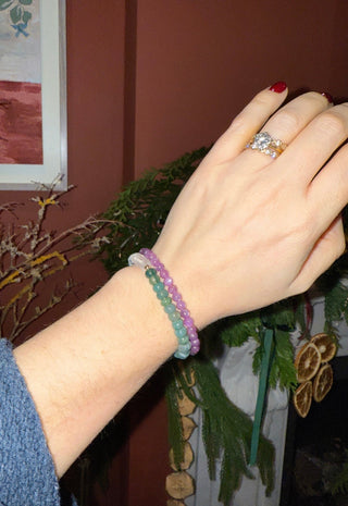 Ruby stretch bracelet, ruby gemstone beads finished with a 14k gold bead.