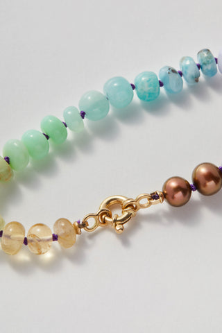 Sardinia Rainbow bracelet, hand-knotted gemstones on silk with a 14k gold clasp.