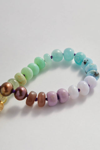 Sardinia Rainbow bracelet, hand-knotted gemstones on silk with a 14k gold clasp.