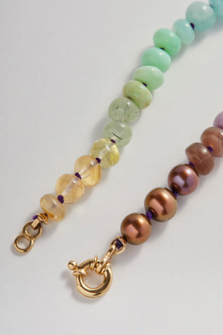 Sardinia Rainbow bracelet, hand-knotted gemstones on silk with a 14k gold clasp.
